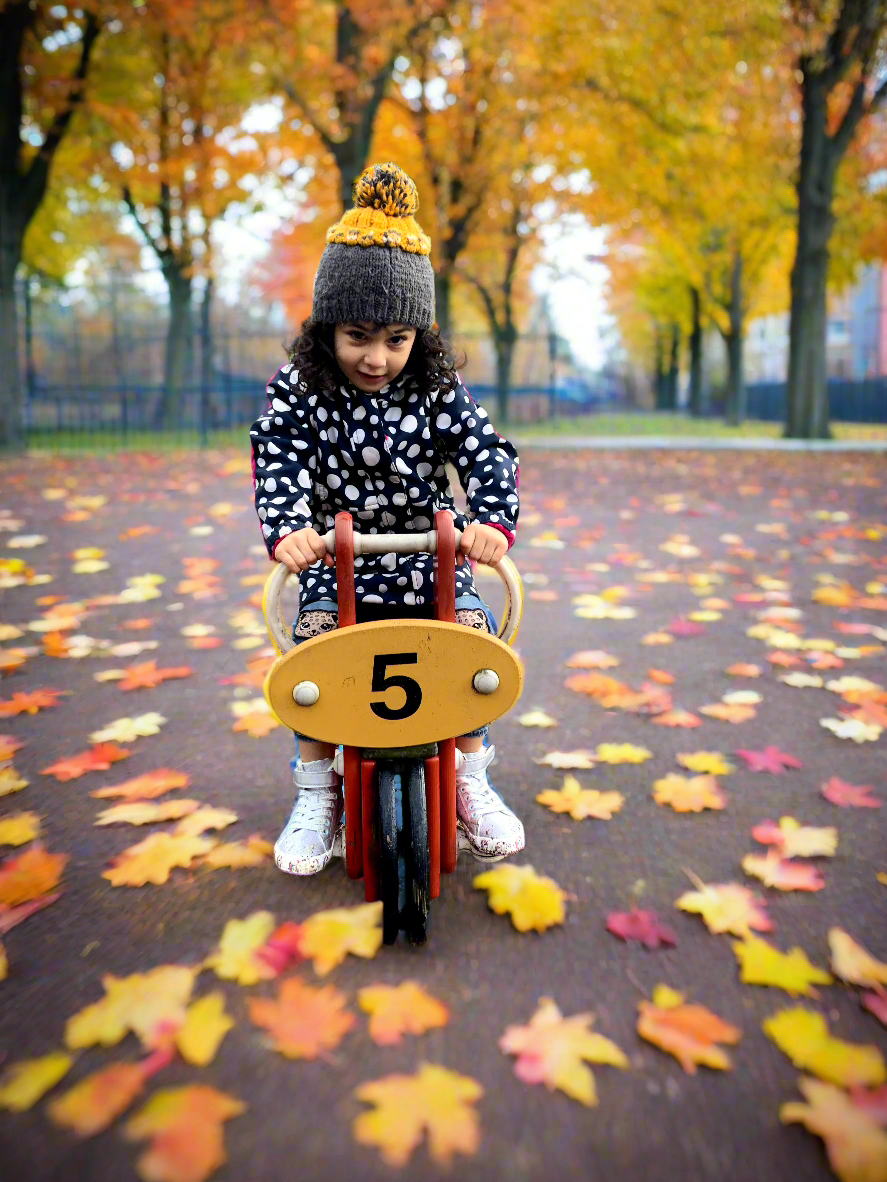 Image of a toddler playing in the park